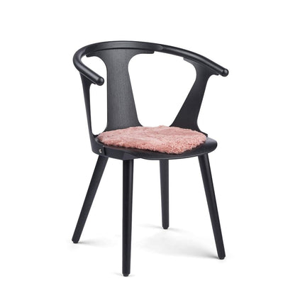 Kort setetrekk i saueskinn av ull Korallrosa